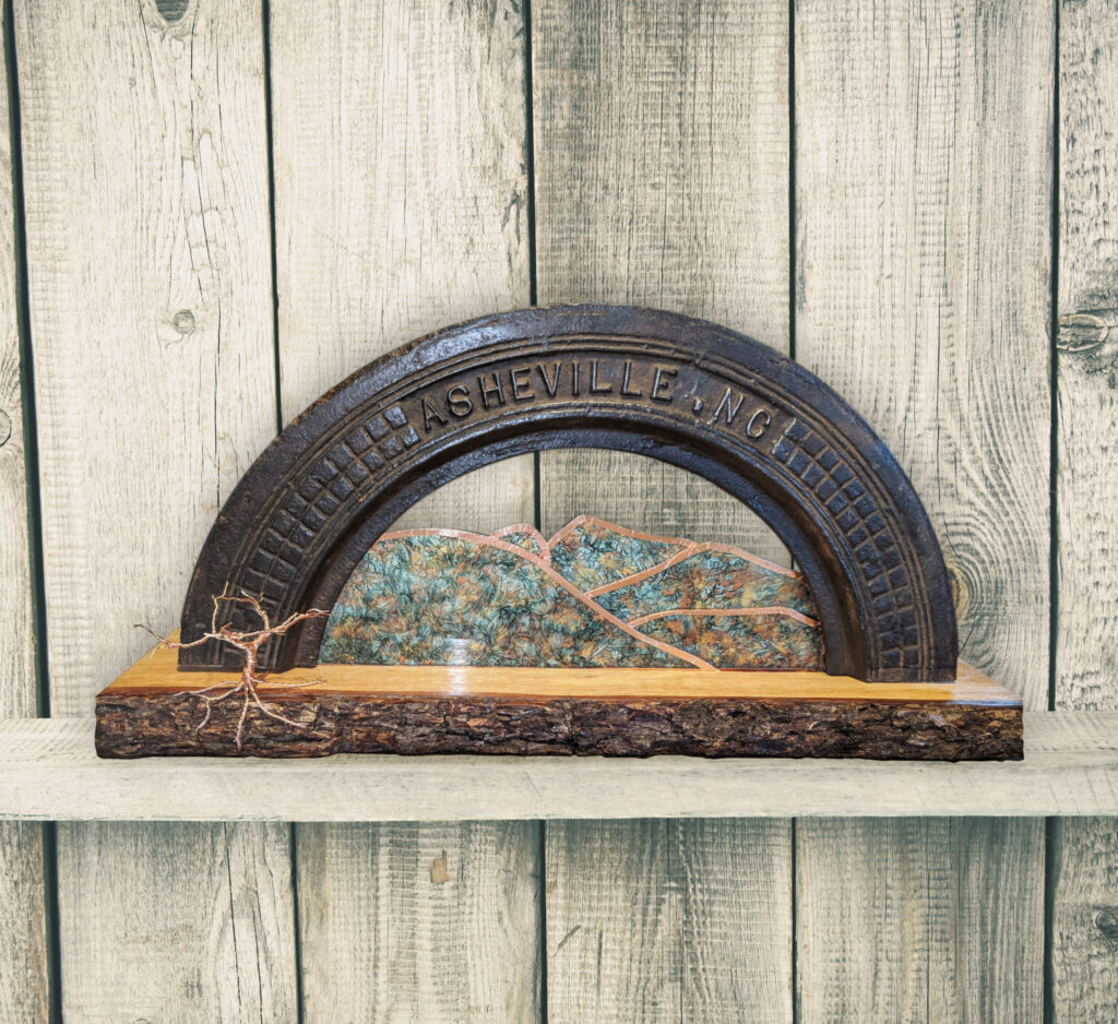 City of Asheville Manhole Cover and Stained Glass Sculpture